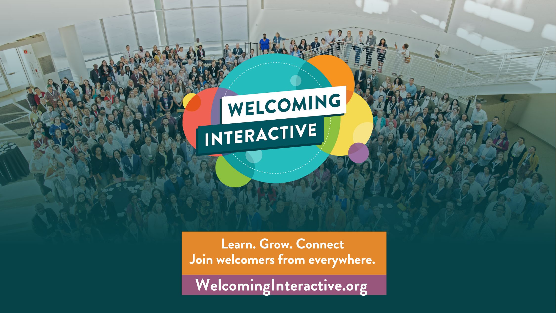 High angle group photo of past Welcoming Interactive attendees, featuring over 500 people. Welcoming Interactive logo, mostly comprised of colorful circles and the words "Welcoming Interactive" is included in the graphic. Other words include: learn, grow, connect. Join welcomers from everywhere.