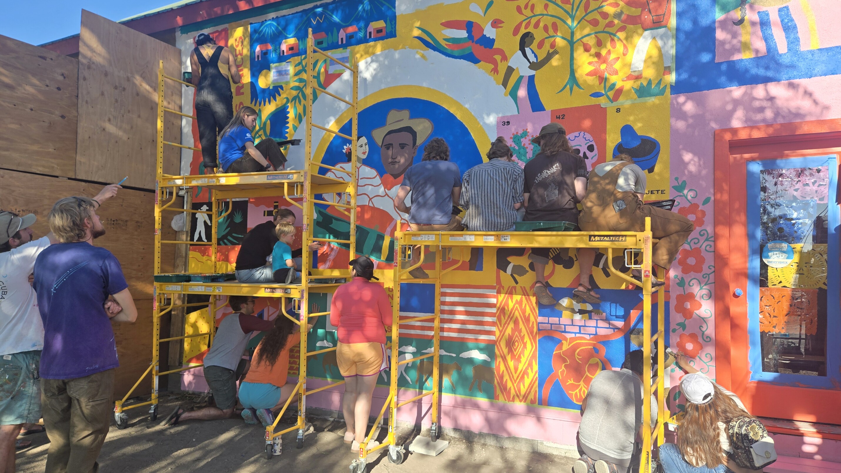 Mural in Gunnison, Colorado painted during Welcoming Week 2024. Photo courtesy of Jessica Wurtz.